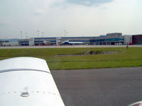  - Taxiing past the Roanoke terminal on our way to rwy 33. - by Peter Steinmaker