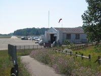  @ Harbor Springs Airport - MGN flight service center - by Geoffrey