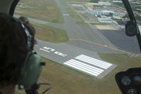  - Mia makes a great crosswind approach to the Whiskey Pad. - by Stephen Amiaga