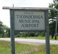  - airport entrance sign - by Timothy Aanerud