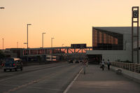  - On the Arrival Level west of Terminal 1 looking west toward Terminal 2 just prior to sunset. - by Dean Heald