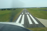  - N6091N landing on 18 - Augusta KS - by Rob Kuhns