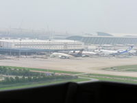  - Cargo ramp at Shanghai Pu Dong Airport - by John J. Boling