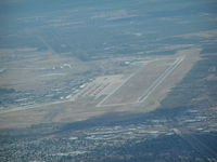  - Davis Monthan AFB. Part of aircraft Boneyard visable left center of photo. - by John J. Boling