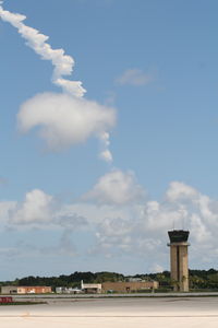  - Daytona Beach tower with smoke from the Space shuttle taking off in the background - by Florida Metal