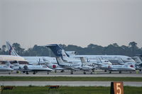  - Planes parked all over the place during the Pepsi 400 - by Florida Metal