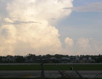  - F-15s line up with towering storm clouds in background - by Florida Metal