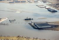  - ~1995 flood at STP.  The Mississippi River floods this airport so often the airport has a procedures manual.  They will even preflood some of the buildings because it's easier to clean up afterwards. - by Timothy Aanerud