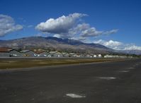  - Old Hangars, Santa Paula Peak in background. Elevation 4.917 ft. - by Doug Robertson