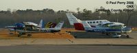  @ Currituck County Regional Airport - The ramp line-up.  Check out the tails - by Paul Perry