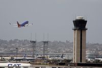  - Southwest plane takeoff and tower - by Chuck Martinez