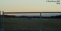  - Looking down RWY4, shortly after sunrise - by Paul Perry
