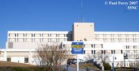  @ Lenoir Memorial Hospital Heliport - The roof mounted windsock, and one of the warning signs at Lenoir Hospital - by Paul Perry
