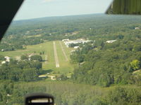  - on final runway 4 - by John Woody