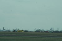  @ Gainesville Municipal Airport - Cargo aircraft parked on east sde of airport - by Mark Pasqualino