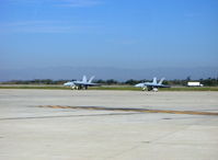  - USN Boeing McDonnell Douglas F/A-18F SUPER HORNETS of VFA-122, NAS Lemoore, two General Electric F414-GE-400 Turbofans 22,000 lb st each, Stealth technology, Hughes APG-73 RADAR. Prototype 1st flight St. Louis, MO. 29 Nov. 1995. - by Doug Robertson