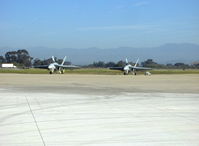  - USN Boeing McDonnell Douglas F/A-18F SUPER HORNETS of VFA-122, NAS Lemoore, two General Electric F414-GE-400 Turbofans 22,000 lb st each, Stealth technology, Hughes APG-73 RADAR. Prototype 1st flight St. Louis, MO. 29 Nov. 1995. - by Doug Robertson