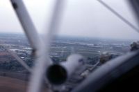  - Lining up to land on runway 15 with light rain, in a PT-17 - by Glenn E. Chatfield