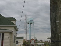  - The water tower tells you where you are. - by Sam Andrews