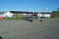  - C140 at the edge of parking lot. - by Robert Thomas