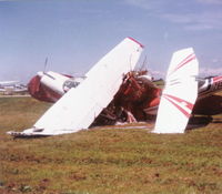  - Tornado damage. Ball of planes - foamed down and No Smoking signs in place - by Bob Simmermon