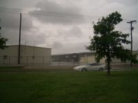  - Fire-damaged hangar row at Arlington Municipal Airport - by AeroTX