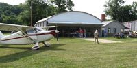  - Riverside, OH breakfast fly-in. Friendly little airport and for the breakfast fly-in they'll feed you until you can't squeeze back into your plane, making it mandatory to walk the line and take photographs. - by Bob Simmermon