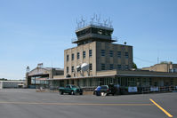  - This old terminal and hangar are the main buildings at Capital City Airport. - by Daniel L. Berek