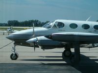  - A Cessna 340 taxiing on the tarmac at Green Bay. - by IndyPilot63