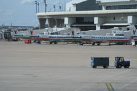  - Terminal B at DFW with American Eagle Embraer EMB-135 Aircraft - by Jeff Sexton