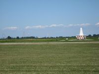  @ Griffing Sandusky Airport - The VOR on the field and Cedar Point amusement park in the background. - by Bob Simmermon