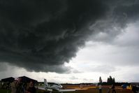  - stormclouds overhead North Weald at Air-Britain's 2007 Fly-In just before tents blew away and the downpour started! - by Pete Hughes