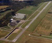  - Complete airport is shown with emphasis on rwy extension and tunnel. - by Williams Aerial Photography