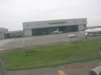  @ Taiwan Taoyuan International Airport (formerly Chiang Kai-Shek International Airport) - Maint area at Chaing Kia Shek airport, Taipei. - by John J. Boling