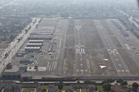  - On final to RWY 25L, slipping to descend more rapidly, this photo shows an overview of Compton Airport. - by Dean Heald