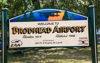  - Airport sign on the flight line - by Mike Madrid