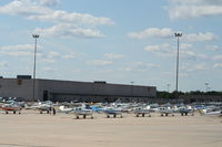  - Beech Bonanzas and Barons preparing to fly to Oshkosh. - by Mark Pasqualino