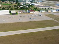  - The building with the maroon roof is the FBO (Harbour Air) - office is on the opposite side. - by Bob Simmermon