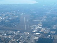  @ Wexford County Airport - Looking down RWY 25.  The lake is a good landmark, but pay attention to the towers up to 3000' all around within a 10nm radius of CAD. - by Bob Simmermon