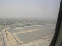  @ Dubai International Airport - Emirates Maintenance Hangar at Dubai - by John J. Boling