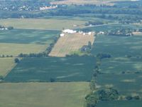  @ Columbus Southwest Airport - Looking east from 2500'.  Looks like Eddie's still keeping it mowed. - by Bob Simmermon
