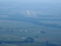  - Looking down RWY 23 from about 8 miles in the summer haze.  Someday I'll get a better shot to replace this one. - by Bob Simmermon