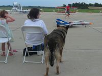  - These planes very real, just small.  See the girl holding her ears.  The mutt isn't very happy, either.  Sean Saddler's RC jets at Airfest 2007 - Bellefontaine, OH - by Bob Simmermon