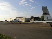  - King Air 200WZ starting up infront of the main buildings at Airlake. - by Mitch Sando