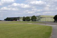  @ RAF Scampton Airport - Flightline at RAF Scampton with Red Arrow Hawk - by Joop de Groot