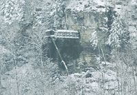  - Meiringen air base has a control towed mounted to the mountain slope. This is used during exercises and in wartime situations. It can be reached via a bridge ending in the mountain. - by Joop de Groot