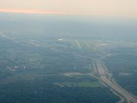  @ Waukesha County Airport - Looking east from 2500' with Lake Michigan reflecting the morning sun in the distance. - by Bob Simmermon