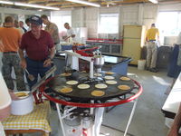  @ Re-dun Field Airport - Fly-In breakfast- one of the DFC members devised this automated flapjack machine; People come many mile to see it in action - by Jim Uber