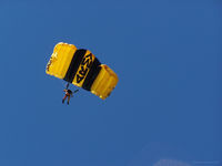  - The Army Golden Knights were out jumping on this day from a ceiling of 12500'  The guys and gals had there stuff together. - by J.B. Barbour