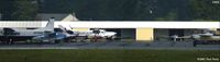  @ Coastal Carolina Regional Airport - Multiple exposure composite of the ramp - by Paul Perry